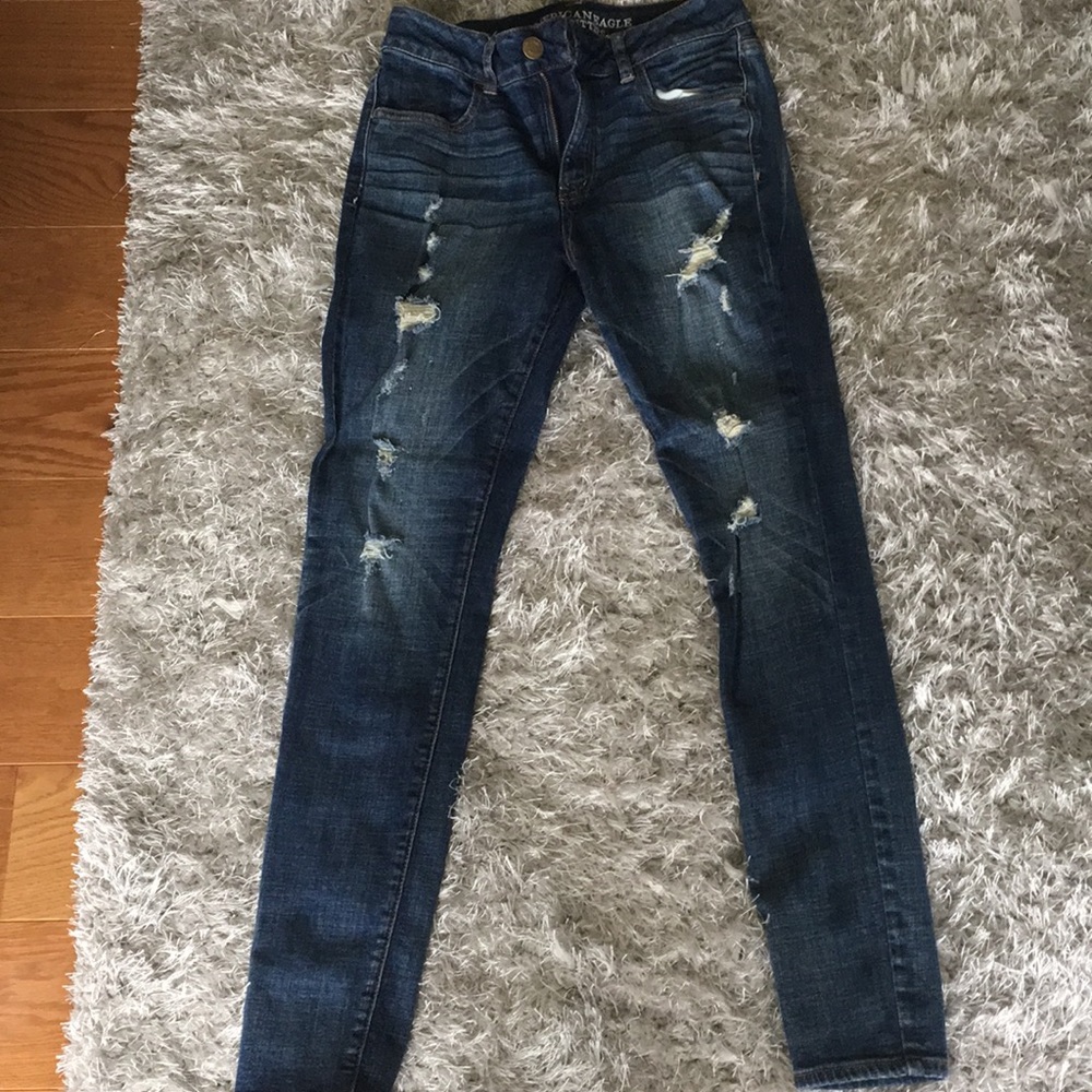 Dark blue skinny jeans with rips